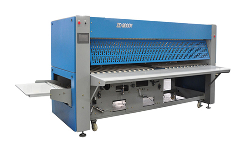 我司水洗廠設(shè)備中的折疊機(jī) 我司水洗廠設(shè)備中的折疊機(jī)